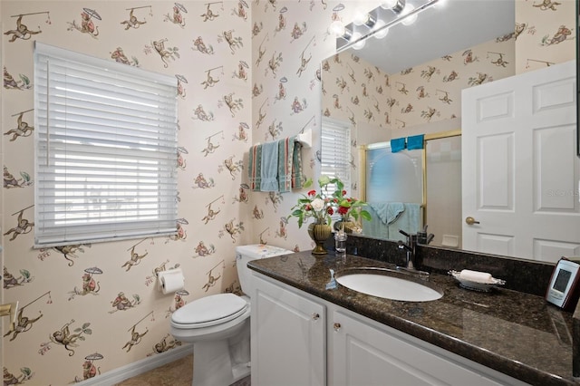 3798 Darston St, Palm Harbor, FL 34685 - full bath with vanity, a shower stall, toilet, and wallpapered walls
