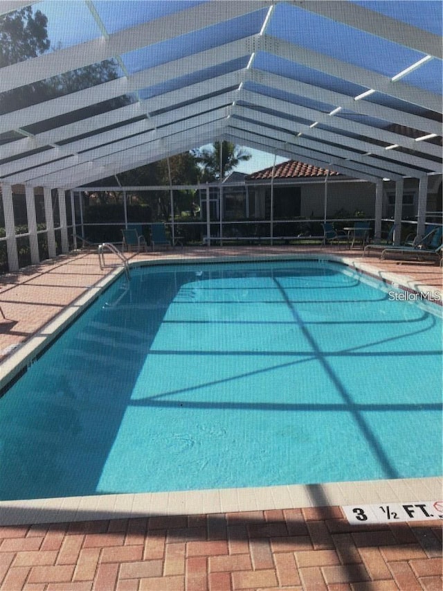 3798 Darston St, Palm Harbor, FL 34685 - community pool with glass enclosure