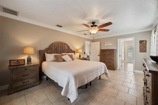 bedroom with visible vents and crown molding