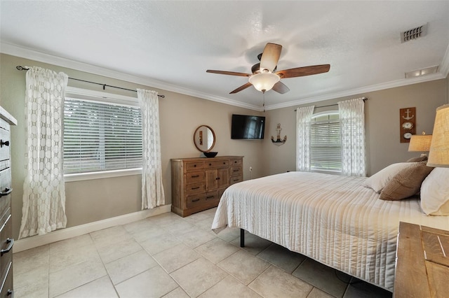 tiled bedroom featuring visible vents, crown molding, baseboards, and ceiling fan