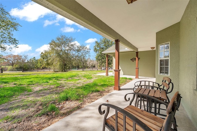 view of patio / terrace with fence