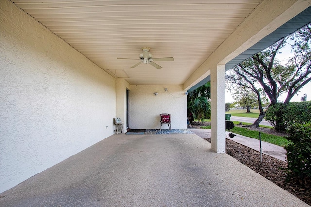 view of patio with ceiling fan