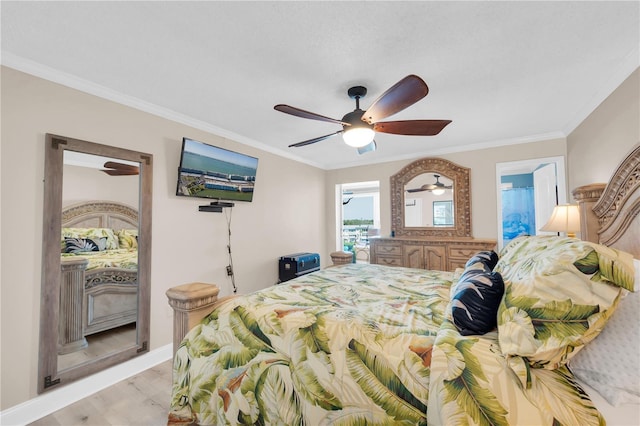 bedroom with light wood-style floors, baseboards, a ceiling fan, and crown molding