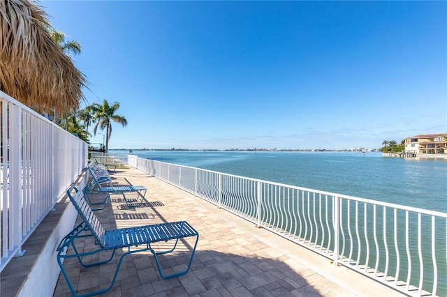 view of patio featuring a water view