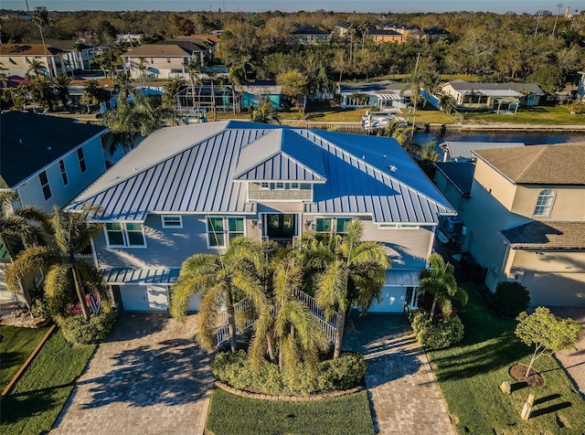 birds eye view of property with a residential view