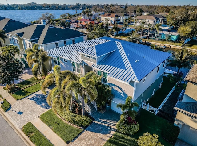 aerial view featuring a residential view and a water view