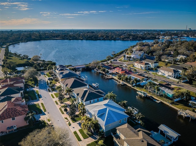 aerial view with a water view and a residential view