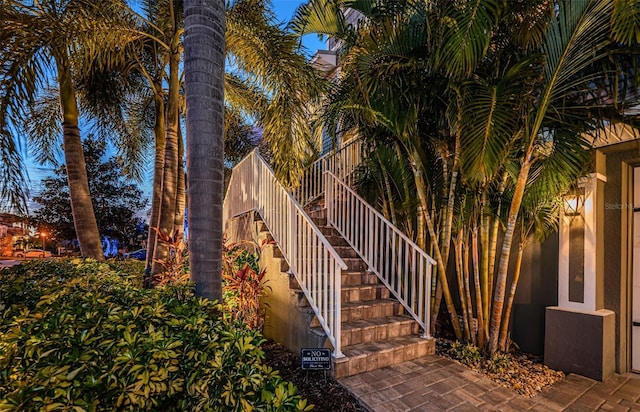 view of home's exterior with stairs