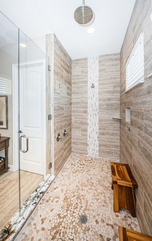 bathroom featuring a stall shower