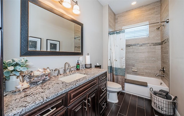 full bath featuring shower / bath combo with shower curtain, vanity, toilet, and wood tiled floor