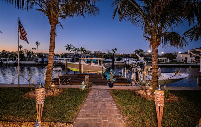 view of dock with a water view and boat lift