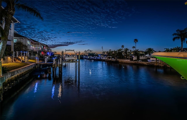 dock area featuring a water view and boat lift