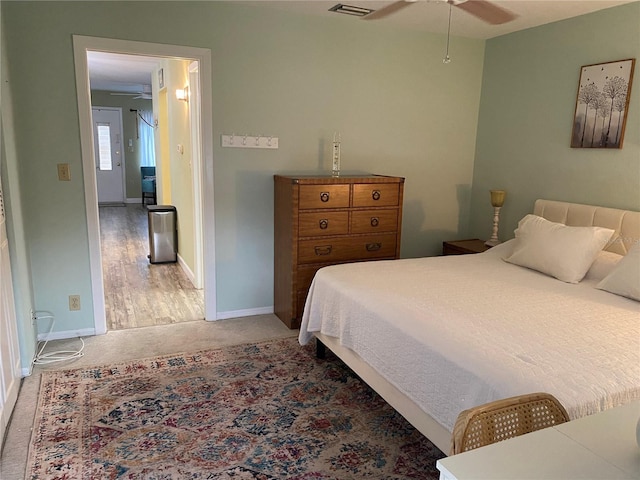 11201 80th Ave Unit 305, Seminole, FL 33772 - bedroom featuring carpet, visible vents, and baseboards
