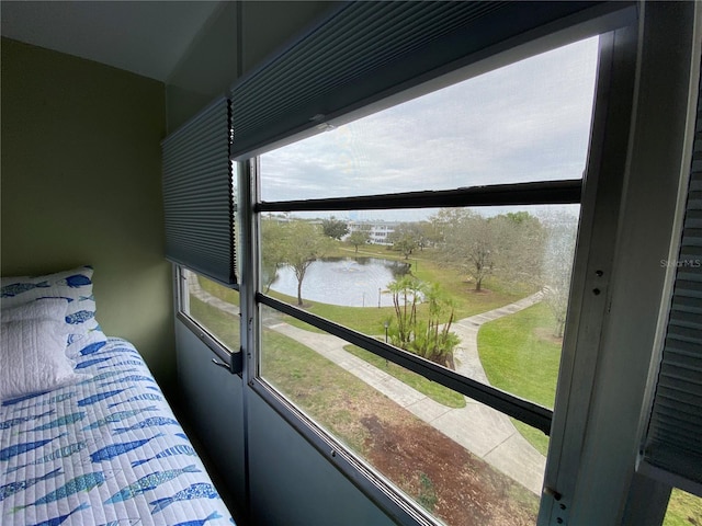11201 80th Ave Unit 305, Seminole, FL 33772 - bedroom featuring a water view