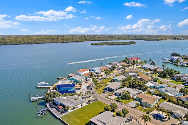 aerial view with a residential view and a water view