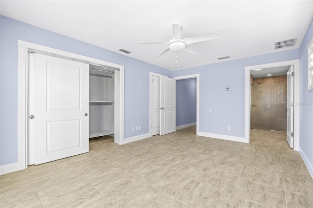 unfurnished bedroom with visible vents, ceiling fan, and baseboards