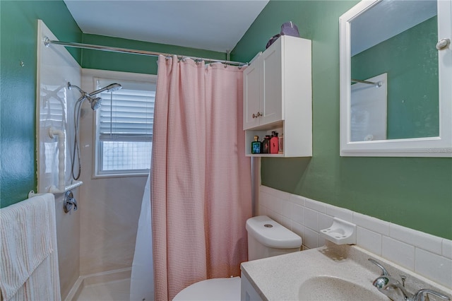 full bath featuring tile walls, vanity, toilet, and a shower with shower curtain