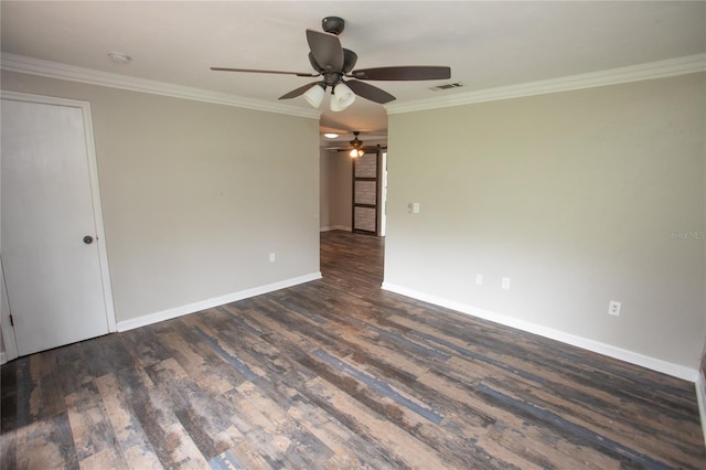unfurnished room featuring baseboards, ornamental molding, wood finished floors, and a ceiling fan