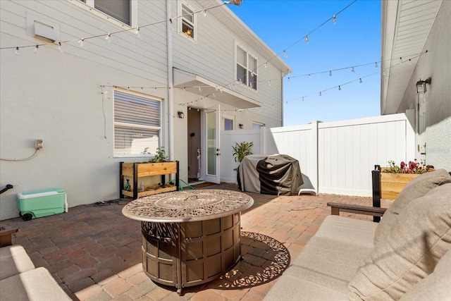 view of patio / terrace with fence