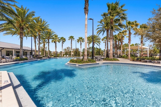 community pool featuring a patio