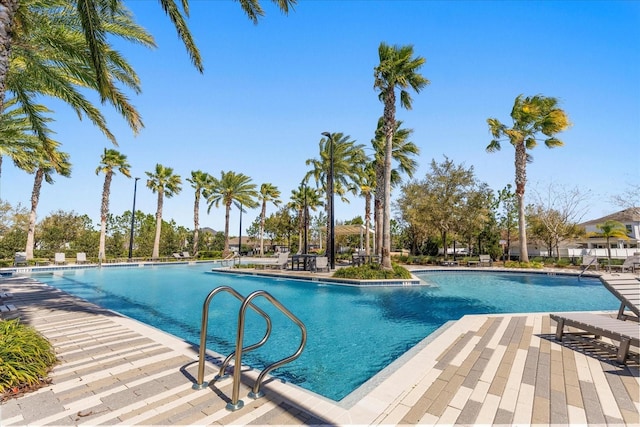 community pool with a patio