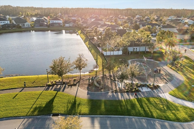 aerial view featuring a residential view and a water view