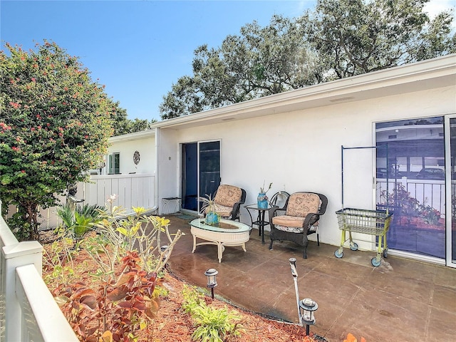 view of patio / terrace with fence