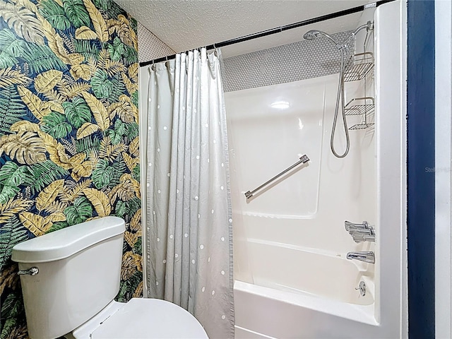 full bathroom with a textured ceiling, shower / tub combo with curtain, toilet, and wallpapered walls