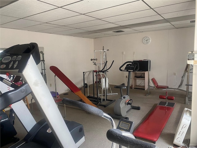 workout area with a drop ceiling