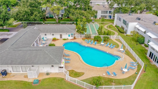 pool featuring a patio area and fence