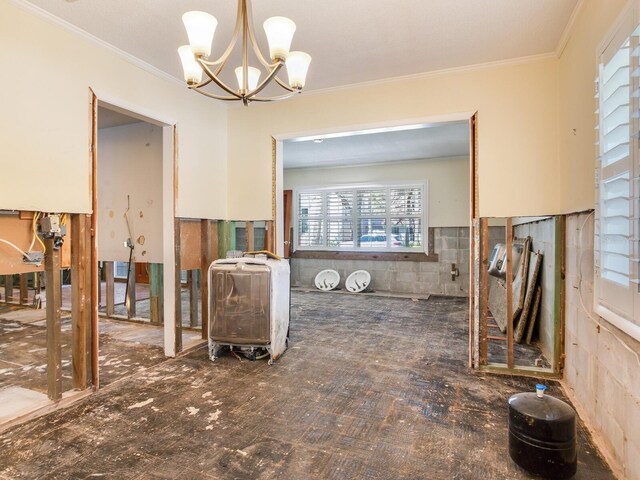 dining room featuring a chandelier and ornamental molding