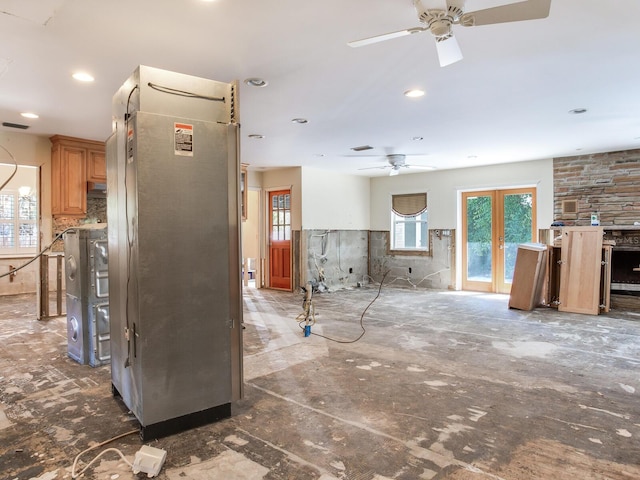 interior space featuring visible vents, recessed lighting, wainscoting, and ceiling fan