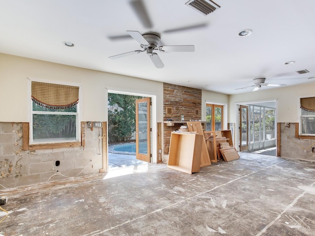 unfurnished living room featuring visible vents, recessed lighting, and a ceiling fan