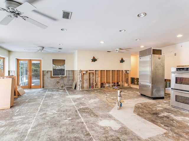 interior space with visible vents, recessed lighting, appliances with stainless steel finishes, french doors, and a ceiling fan