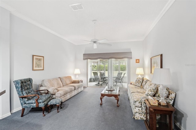 living room with a ceiling fan, visible vents, baseboards, crown molding, and carpet flooring