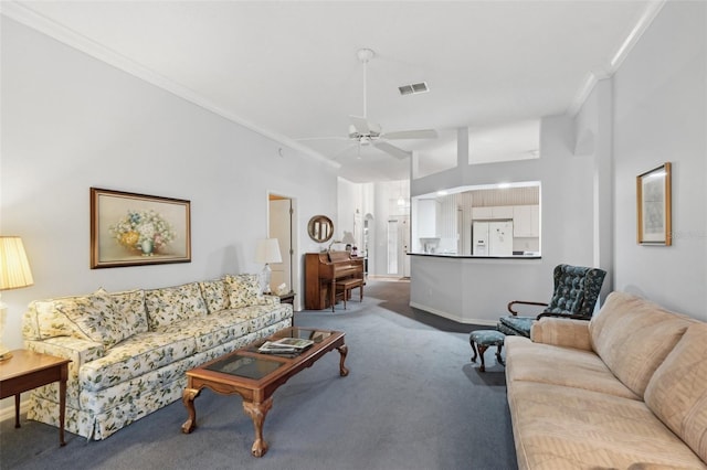 living room with visible vents, ornamental molding, carpet flooring, ceiling fan, and vaulted ceiling