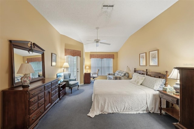 bedroom with visible vents, lofted ceiling, a ceiling fan, and dark carpet