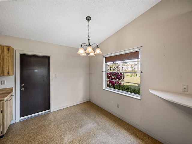 unfurnished dining area with an inviting chandelier, light carpet, vaulted ceiling, a textured ceiling, and baseboards