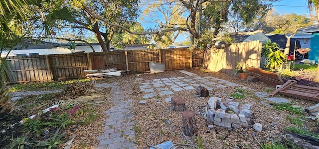 view of yard with a fenced backyard