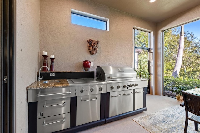 view of patio / terrace featuring a sink, grilling area, and area for grilling