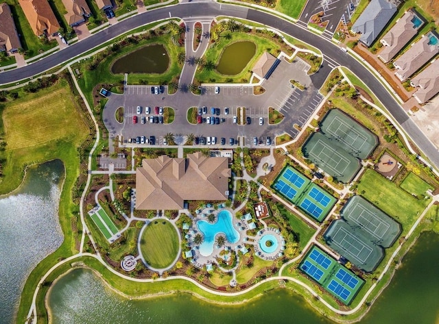 birds eye view of property featuring a water view