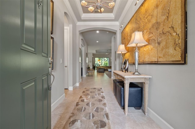 9708 Highland Park Pl, Palmetto, FL 34221 - entrance foyer featuring arched walkways, a chandelier, crown molding, recessed lighting, and a tray ceiling