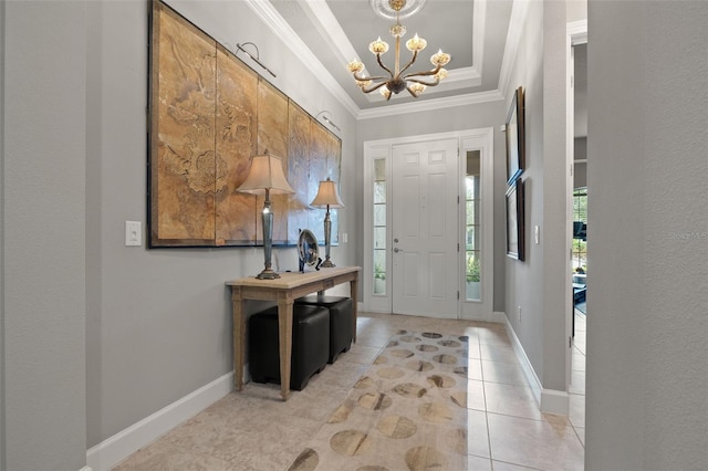 9708 Highland Park Pl, Palmetto, FL 34221 - foyer entrance with a chandelier, crown molding, a raised ceiling, and light tile patterned flooring
