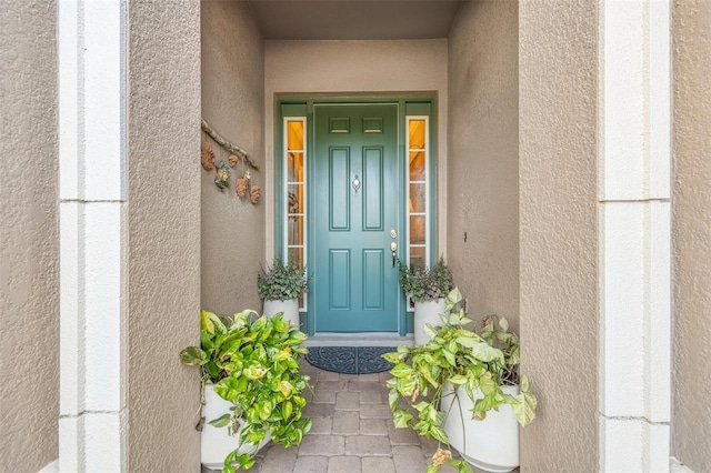 9708 Highland Park Pl, Palmetto, FL 34221 - view of exterior entry featuring stucco siding