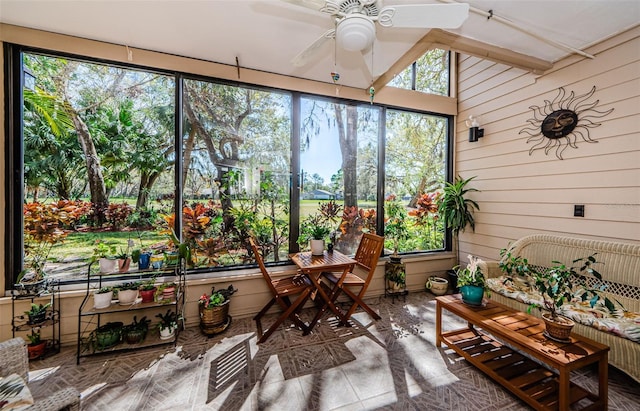 sunroom / solarium with visible vents and a ceiling fan