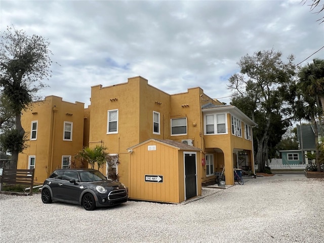 view of front of house featuring stucco siding