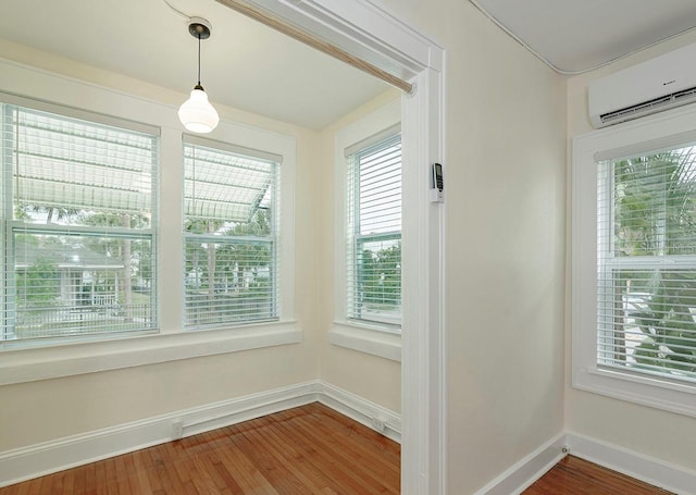 interior space featuring a wall mounted AC