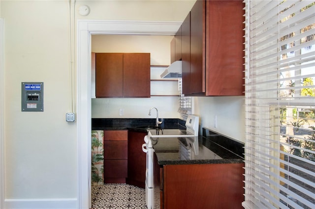 kitchen featuring electric stove, dark stone countertops, open shelves, a sink, and exhaust hood