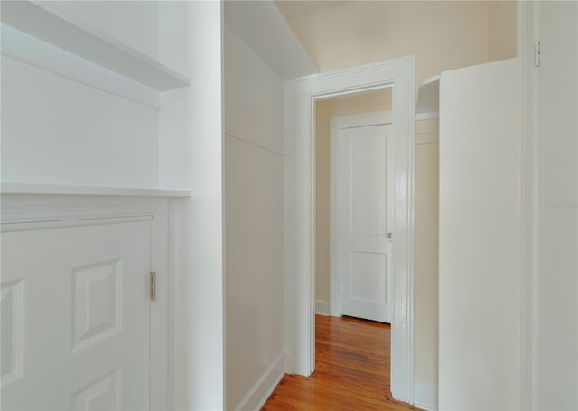 hallway with light wood-style flooring