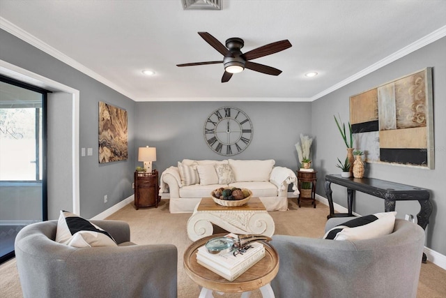 living area featuring light colored carpet, crown molding, and baseboards